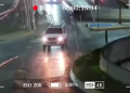 Dashcam View of a White Suv Driving Through a Wet, Rain-soaked Street at Night, Headlights On, Reflections on the Flooded Road. - Apoyo Regio